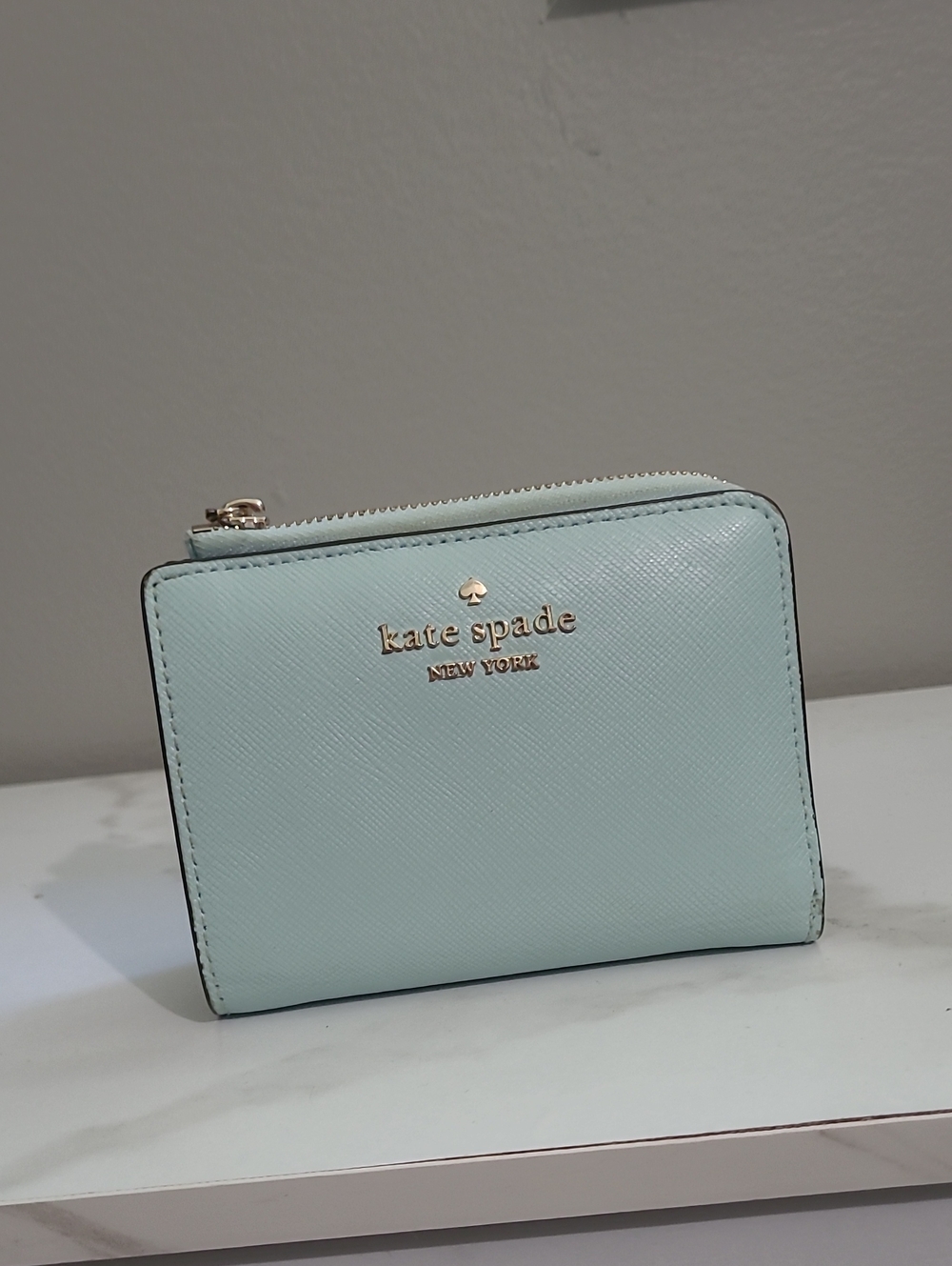 kate spade Small L Zip pale mint zip-around compact wallet with gold logo